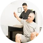 Doctor performing checkup on male patient