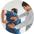Doctor performing checkup on male patient